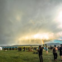 Storm clouds and a rainbow over the festival grounds at Fire in the Mountains 2019