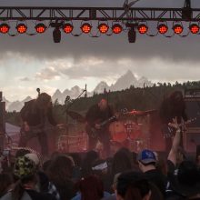 Ruins of Beverast live at Fire in the Mountains 2019 with storm clouds and the Tetons in the background